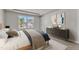 Stylized bedroom with rug, view of neighborhood, decorative art and attractive furnishings at 1723 Starlit Sky Ln, Cary, NC 27519