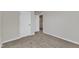 Neutral bedroom featuring carpeted floors and bright white trim at 1723 Starlit Sky Ln, Cary, NC 27519