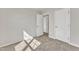 This is a well-lit bedroom with neutral walls and carpet at 1723 Starlit Sky Ln, Cary, NC 27519