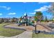 Community playground featuring slides and play equipment for  at 1723 Starlit Sky Ln, Cary, NC 27519