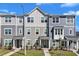 Attractive townhomes feature varied siding, well-manicured lawns and sidewalks for community charm at 1723 Starlit Sky Ln, Cary, NC 27519