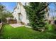 Backyard featuring artificial turf, a patio, and low-maintenance landscaping at 1800 Pierre Pl, Apex, NC 27502