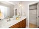 Bathroom vanity features double sinks, ample lighting and a spacious feel at 1800 Pierre Pl, Apex, NC 27502