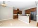 Kitchen featuring granite countertops, stainless steel appliances, and wood cabinets at 1800 Pierre Pl, Apex, NC 27502