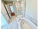 Stylish bathroom features a modern shower and luxurious soaking tub at 20 Eagle Crest Court Way # Holly Farmhouse, Lillington, NC 27546