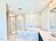 Primary bathroom featuring walk-in shower, soaking tub, and double vanity with marble finishes at 20 Eagle Crest Court Way # Holly Farmhouse, Lillington, NC 27546