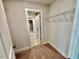 Walk-in closet with wire shelving and carpet flooring at 20 Eagle Crest Court Way # Holly Farmhouse, Lillington, NC 27546