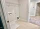Laundry room with tile flooring and connections for washer and dryer at 20 Eagle Crest Court Way # Holly Farmhouse, Lillington, NC 27546