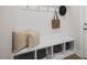 Mud room with white cabinets, wall hooks, and bench seating at 20 Eagle Crest Court Way # Holly Farmhouse, Lillington, NC 27546