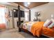 Stunning primary bedroom with a fireplace, TV, and four-poster bed at 207 Kinnakeet Dr, Durham, NC 27704