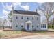 Charming two-story home featuring a symmetrical facade and a welcoming entrance at 2110 Cokey Rd, Rocky Mount, NC 27801