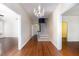 Spacious hallway with hardwood floors, chandelier, staircase, and multiple entrances at 2110 Cokey Rd, Rocky Mount, NC 27801