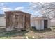 Home featuring two sheds, with weathered siding at 2110 Cokey Rd, Rocky Mount, NC 27801