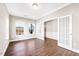 Bright office space with hardwood floors, natural light, and elegant French doors at 212 Wildwood Ln, Graham, NC 27253