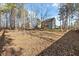 Large, expansive backyard with mature trees, perfect for outdoor activities and privacy at 2504 Georgianna Dr, Wake Forest, NC 27587