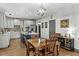 An open kitchen and dining area with a central island, recessed lighting, and stainless steel appliances at 2504 Georgianna Dr, Wake Forest, NC 27587