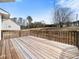 Large backyard with a wooden deck, perfect for entertaining guests at 2574 Primrose Ln, Creedmoor, NC 27522