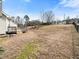 Spacious backyard offering endless possibilities for outdoor activities and relaxation at 2574 Primrose Ln, Creedmoor, NC 27522