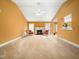 Large living room with fireplace, high ceilings and seamless flow to breakfast area at 2574 Primrose Ln, Creedmoor, NC 27522