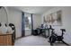 Functional home office with a modern desk setup and exercise bike for a balanced lifestyle at 268 Sweetbay Tree Dr, Wendell, NC 27591