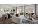 Bright living room with stylish decor, comfortable seating, and hardwood floors with seamless kitchen access at 270 Sweetbay Tree Dr, Wendell, NC 27591