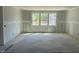 Unfinished large living room, showcasing a spacious layout awaiting final touches at 277 Gregory Village Dr, Lillington, NC 27546