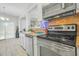 Functional kitchen featuring white cabinets, stainless steel appliances, and ample counter space at 3137 Groveshire Dr, Raleigh, NC 27616