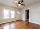 Inviting living area with gleaming wood floors, bright windows, and easy access to other rooms at 318 Mcmasters St, Chapel Hill, NC 27516