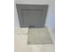 Close-up of home construction materials, including stone gray cabinet, quartz countertop, and level 2 tile flooring at 328 Chesapeak Commons St # 142, Garner, NC 27529