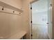 Mudroom area with coat hooks, bench and storage at 3291 Roundly Rd # 14, New Hill, NC 27562
