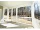 Inviting porch with white railings offering scenic views of the surrounding landscape at 3291 Roundly Rd # 14, New Hill, NC 27562