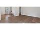 Bright living room features hardwood floors and an entryway with storage and bench seating at 35 Rogerson Dr, Chapel Hill, NC 27517