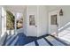 Cozy sunroom featuring views, wood paneling, and natural light at 35 Rogerson Dr, Chapel Hill, NC 27517