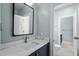 Bathroom has a modern aesthetic, neutral walls, and plenty of natural light at 3513 Eden Croft Dr, Raleigh, NC 27612