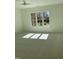 Bright bedroom features a ceiling fan and a large window offering plenty of natural light at 3513 Eden Croft Dr, Raleigh, NC 27612