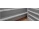 Walk-in closet features custom shelving and storage solutions for optimal organization at 3513 Eden Croft Dr, Raleigh, NC 27612