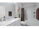 Cozy bathroom features a single sink, toilet, and shower with a curtain at 3528 Olive Glen Dr, Apex, NC 27502