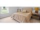 Comfortable bedroom with a plush bed, soft lighting, and neutral décor and ample natural light at 3528 Olive Glen Dr, Apex, NC 27502