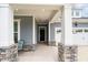 Welcoming entryway with hardwood floors, high ceilings, and access to the garage and other rooms at 3528 Olive Glen Dr, Apex, NC 27502
