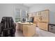 Bright home office space with modern furniture and natural light at 3528 Olive Glen Dr, Apex, NC 27502