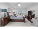 Comfortable main bedroom with elegant furniture, soft lighting, and a serene ambiance at 3528 Olive Glen Dr, Apex, NC 27502