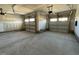 Spacious two car garage with concrete floor and garage door openers installed at 38 Flatland Dr, Princeton, NC 27569