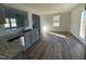 View of Kitchen with stainless appliances, granite countertops, and open floorplan at 38 Flatland Dr, Princeton, NC 27569