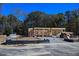 Framing of a new home under construction showing the layout and design, surrounded by trees at 3821 Fairway View Dr # 11, Fuquay Varina, NC 27526