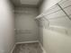 Walk-in closet with wire shelving, providing ample storage space for clothing and accessories at 39 Flatland Dr, Princeton, NC 27569