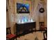 Dining room featuring a decorative buffet with lighted Christmas trees, a wreath, and floral wallpaper at 405 N Massey St, Selma, NC 27576