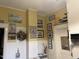Bright yellow kitchen with decorative wall art at 405 N Massey St, Selma, NC 27576