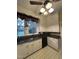 Classic kitchen with white cabinets and dark countertops at 405 N Massey St, Selma, NC 27576