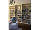 Cozy living room with a built-in bookcase and a comfortable chair at 405 N Massey St, Selma, NC 27576