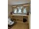 Cozy reading nook with shelving and a chair at 405 N Massey St, Selma, NC 27576